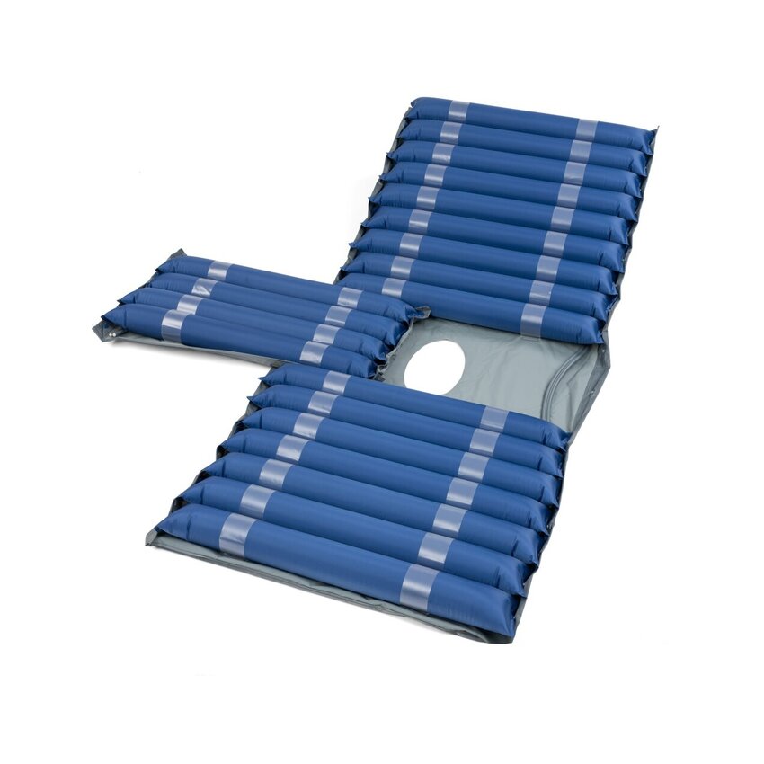 Mattress against pressure sores with compressor removable part for feces and urine